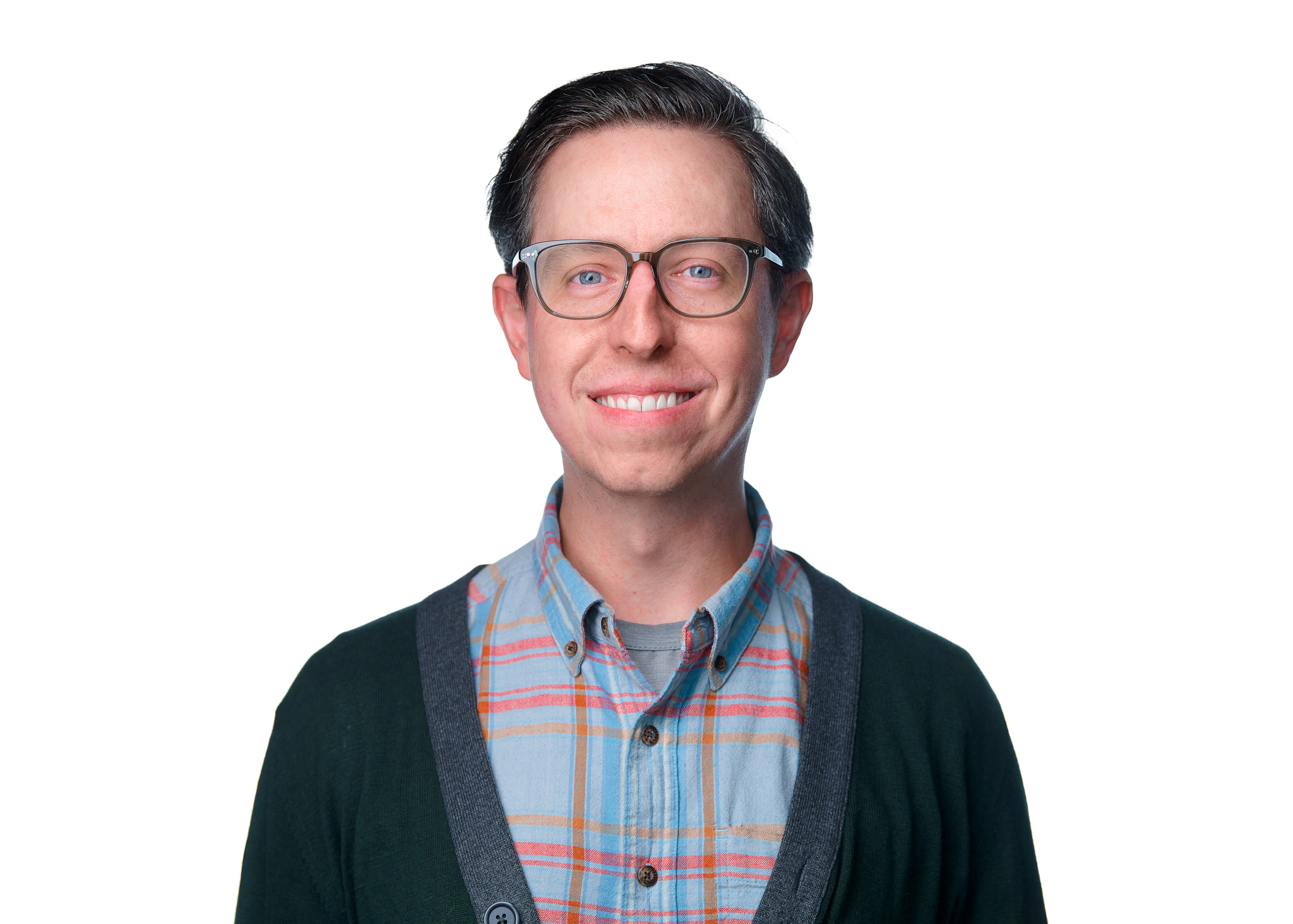 portrait of man in glasses and plaid shirt